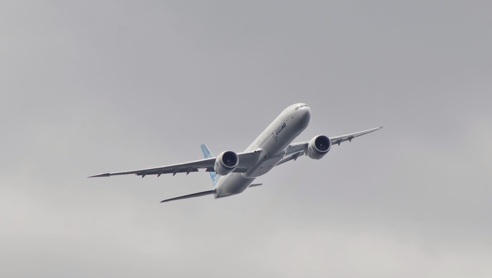 Aircraft in flight over the clouds